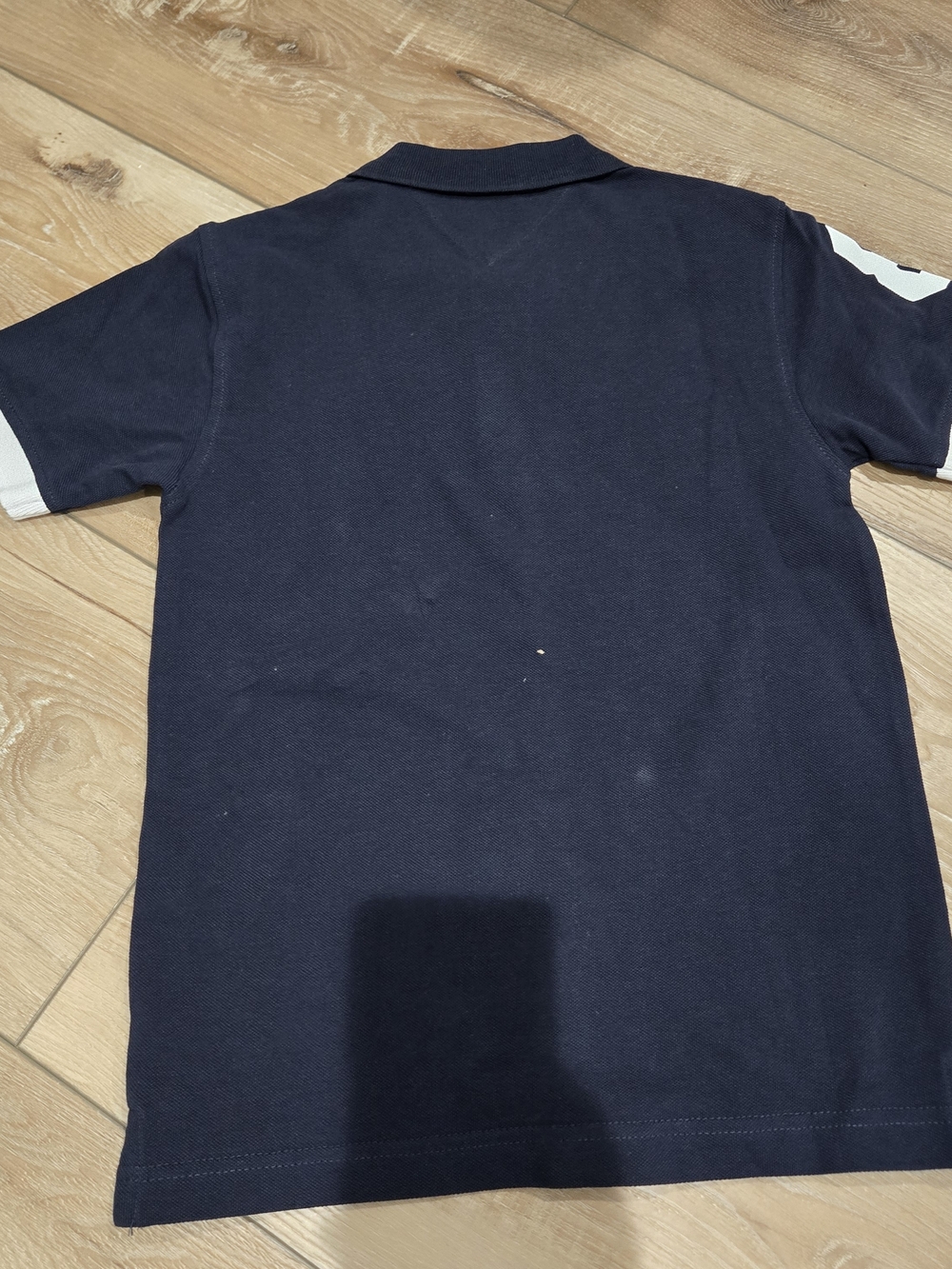 Tommy Hilfiger Navy Polo with White Lettering and Red Logo - Picture 7 of 7